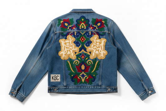 Custom embroidered denim jacket by Kingbird Clothing – high-density logo embroidery, chenille patches, KBC branding, B2B OEM factory